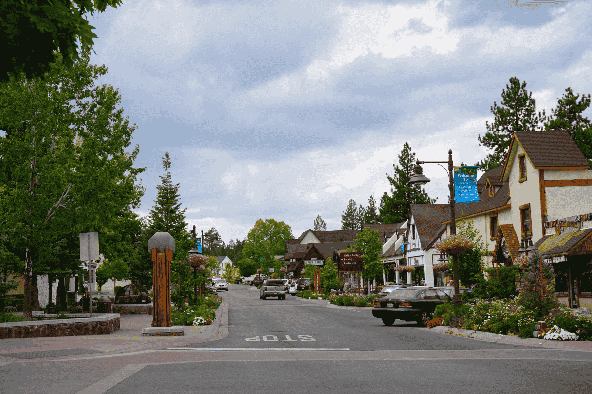Beautiful Shot Of The Village In Big Bear Ca With Trees And Blue Sky 001