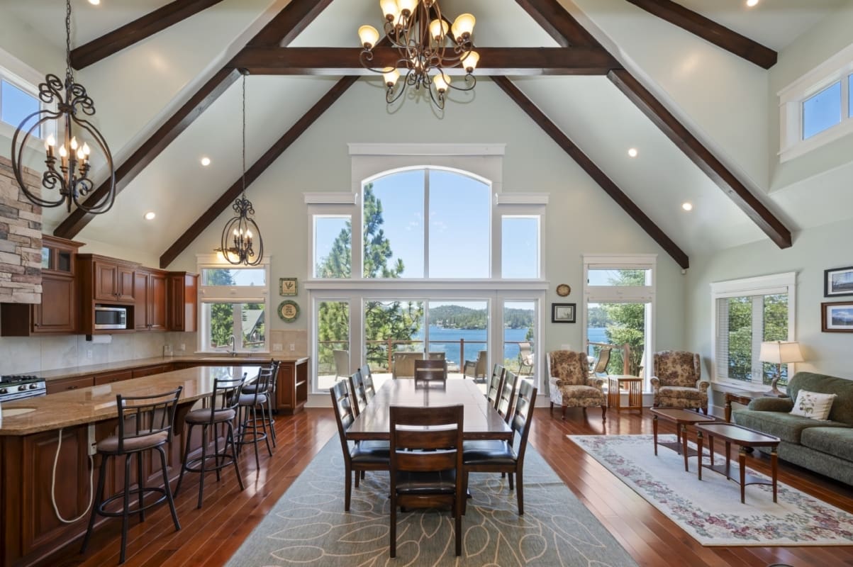 Vaulted beamed great room with panoramic lake views