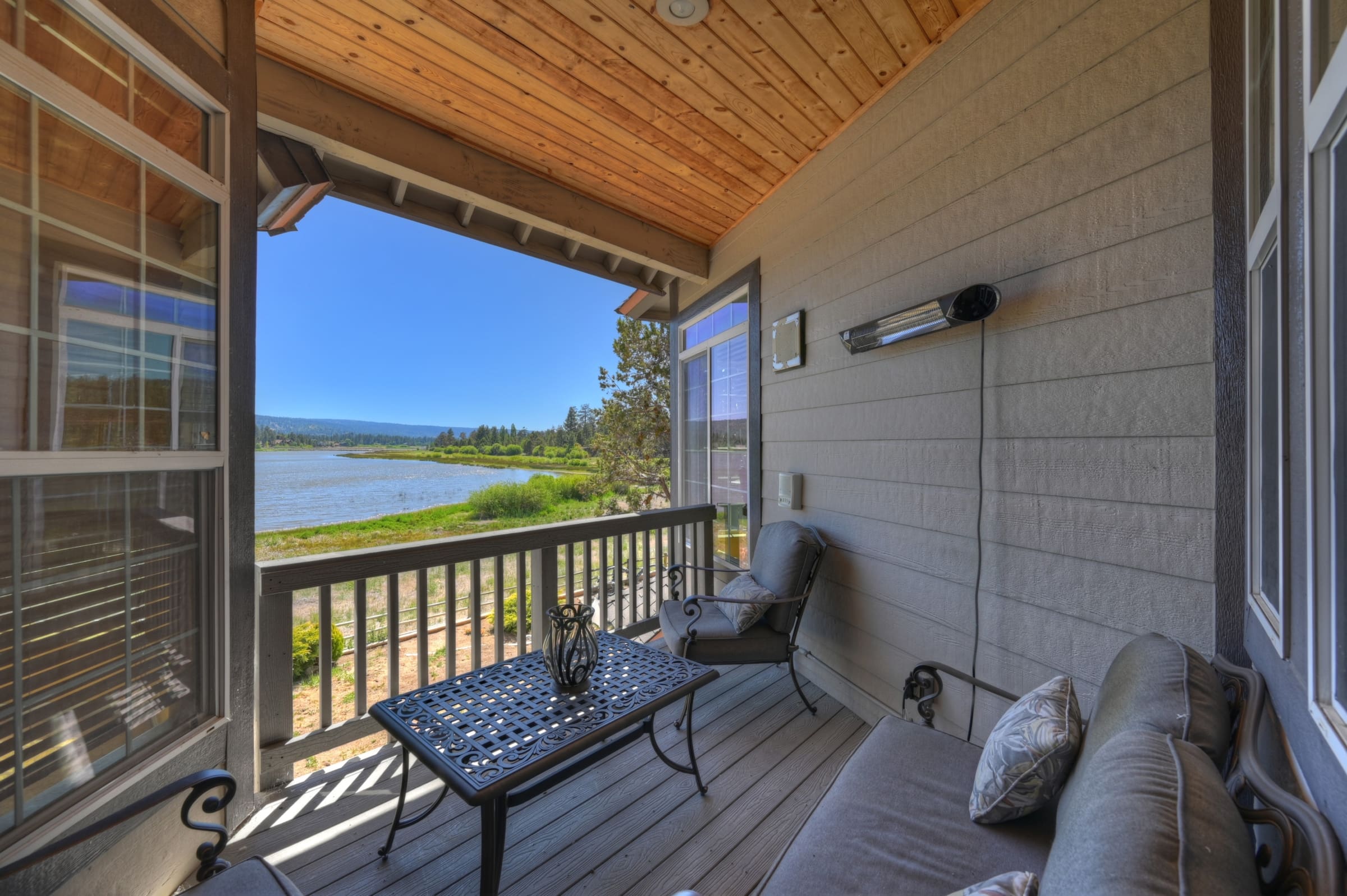 Covered deck with sweeping lake views